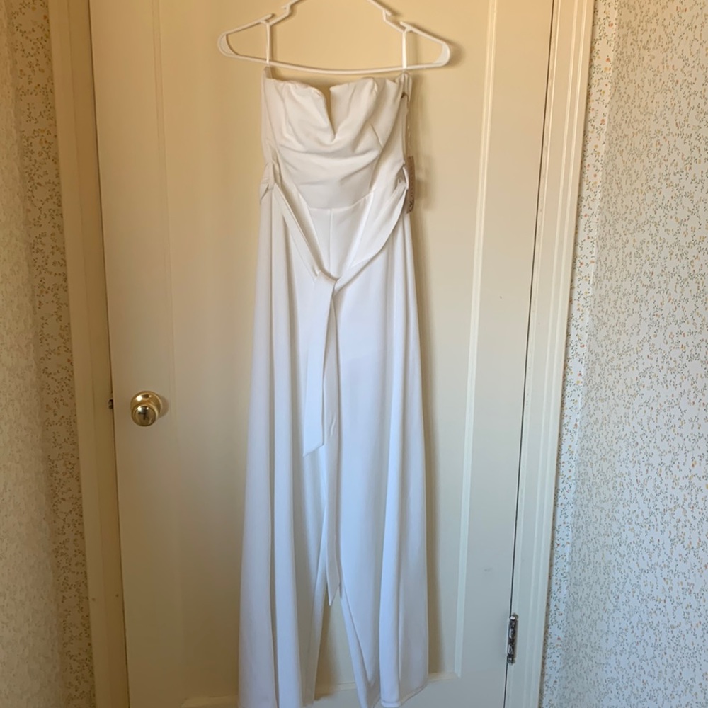She+Sky NWT white Jumpsuit Purchased from Savannah sevens Tie in front Strapless